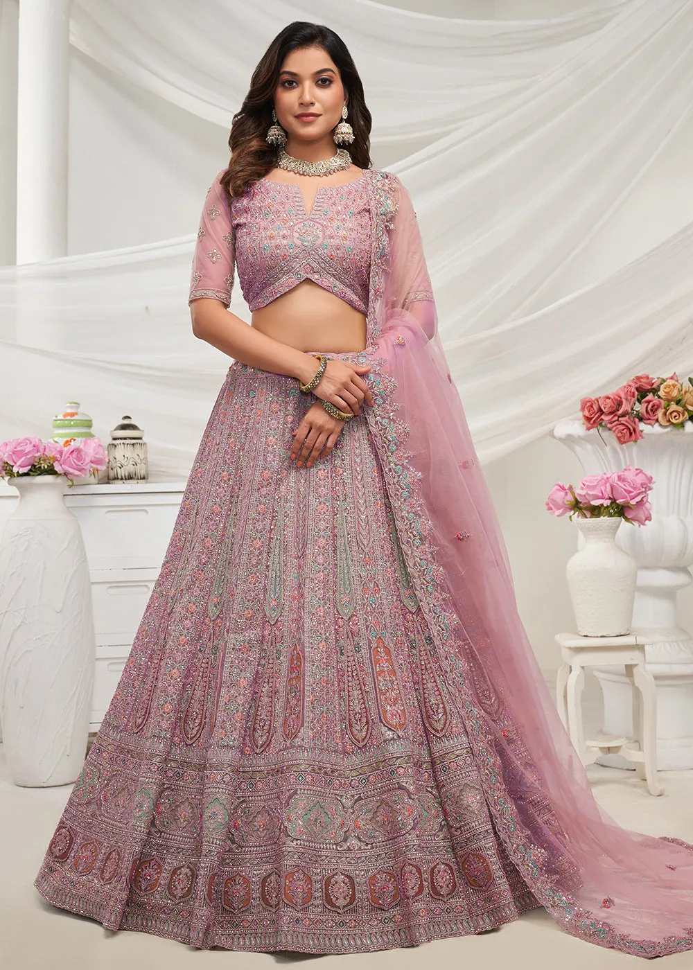 Soft Net Mauve Heavy Embroidered Bridal Style Lehenga Choli